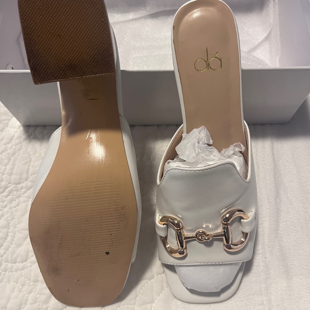 White and Black pair of Women's Slide Sandals